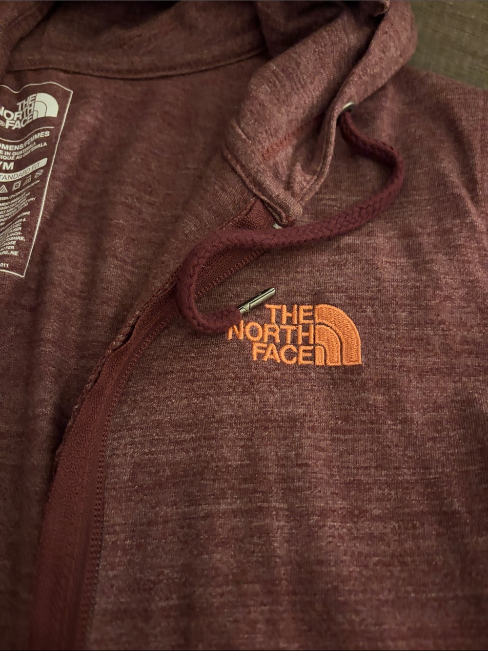 The North Face Women's Maroon Hoodie with Orange Logo